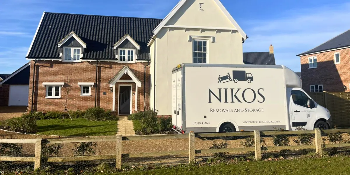 Moving van navigating narrow historic streets in Bury St Edmunds.